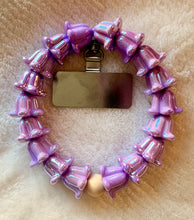 Load image into Gallery viewer, Crown Flower Cell Phone Wristlet
